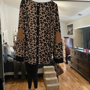 This is a Pink Clover brown leopard print sweater